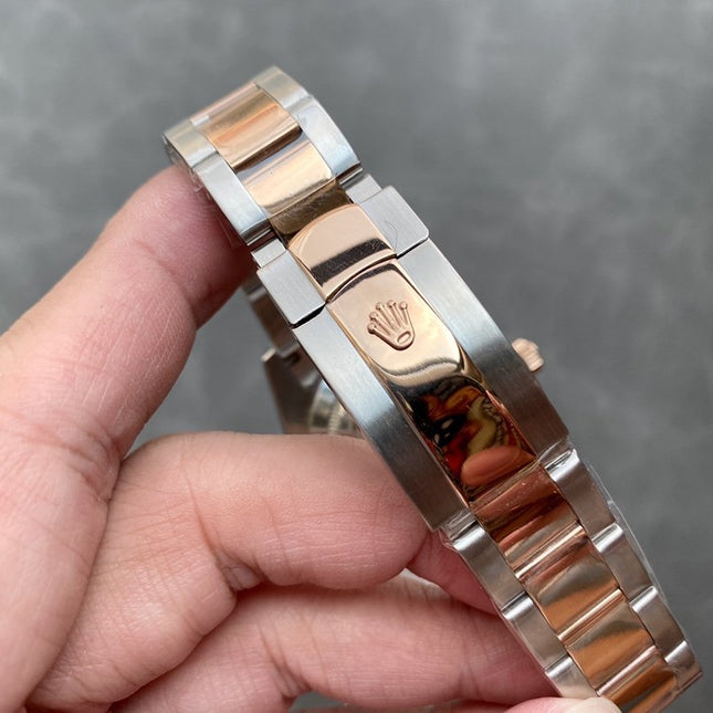 SKY-DWELLER TWO-TONE 42 ROSE GOLD BEZEL BLACK DIAL
