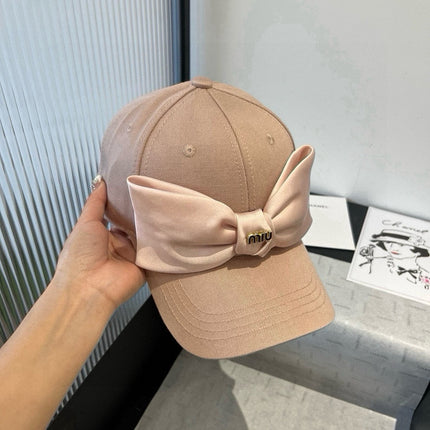 MIUMIU BASEBALL CAP IN BEIGE FABRIC WITH LARGE PINK BOW