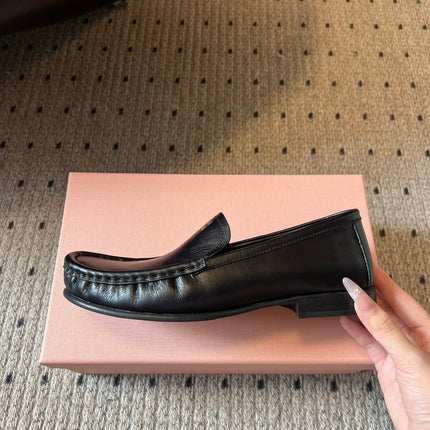 MIUMIU 26S LOAFERS IN BLACK CALFSKIN