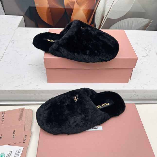 MIUMIU 26S MULES IN BLACK SHEARLING