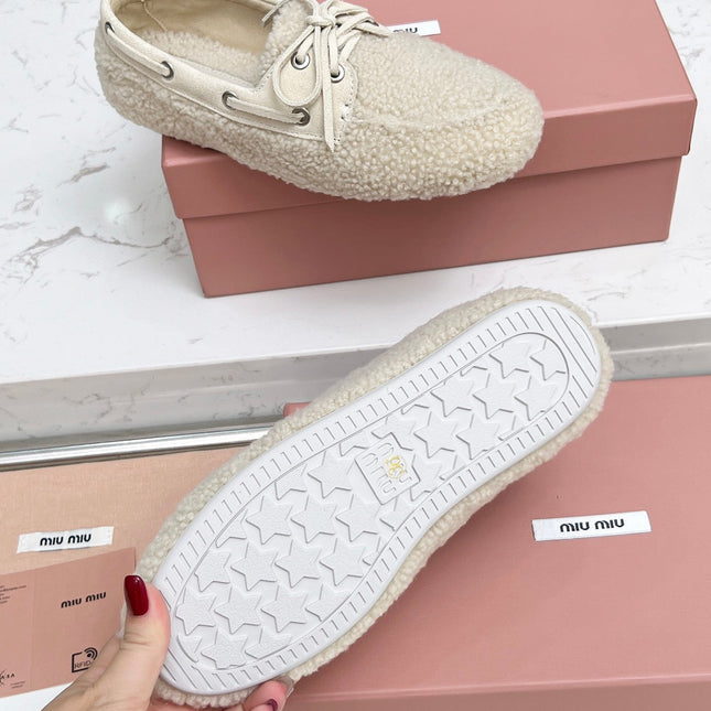 MIUMIU 26S BOAT LOAFERS IN BEIGE SHEARLING