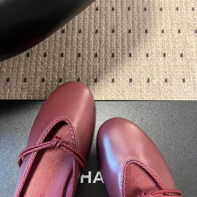 BOTTEGA VENETA 26S FLAT MULES IN DARK RED LAMBSKIN