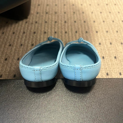 BOTTEGA VENETA 26S FLAT MULES IN BLUE LAMBSKIN