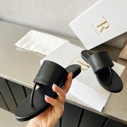THE ROW 26S FLAT THONG SANDALS IN BLACK CALFSKIN