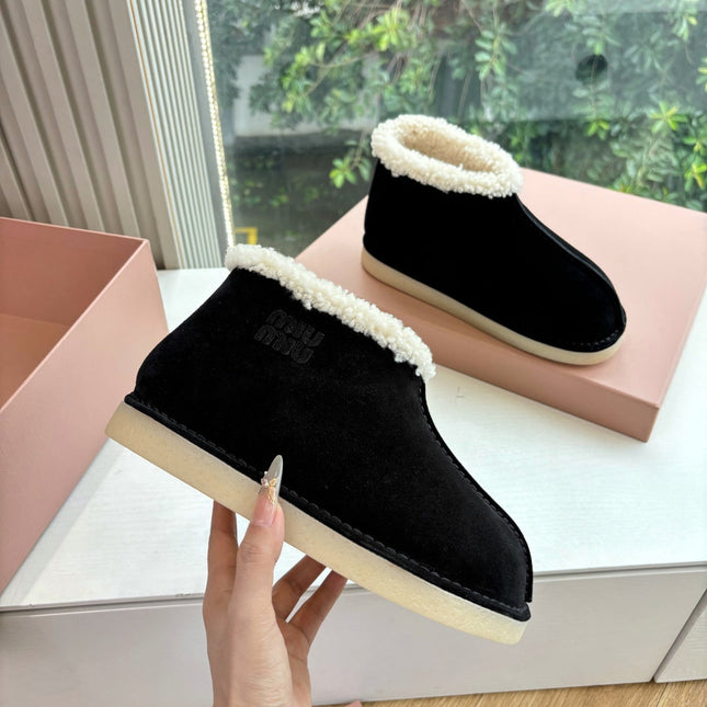 MIUMIU 26S ANKLE BOOTS IN BLACK SUEDE AND SHEARLING