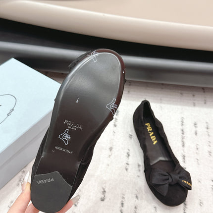 PRADA 26S ROUND TOE FLATS WITH BOW IN BLACK SUEDE