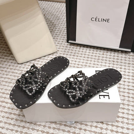 LOEWE 26S PETAL ANAGRAM SLIDE IN BLACK CALFSKIN WITH STUDS