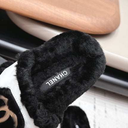 CHANEL 26S SLIDE SANDALS IN BLACK SHEARLING AND WHITE STRAP