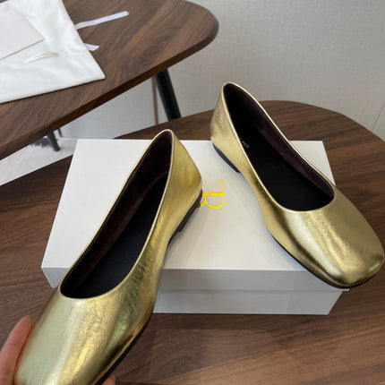THE ROW 26S FLATS IN GOLD CALFSKIN