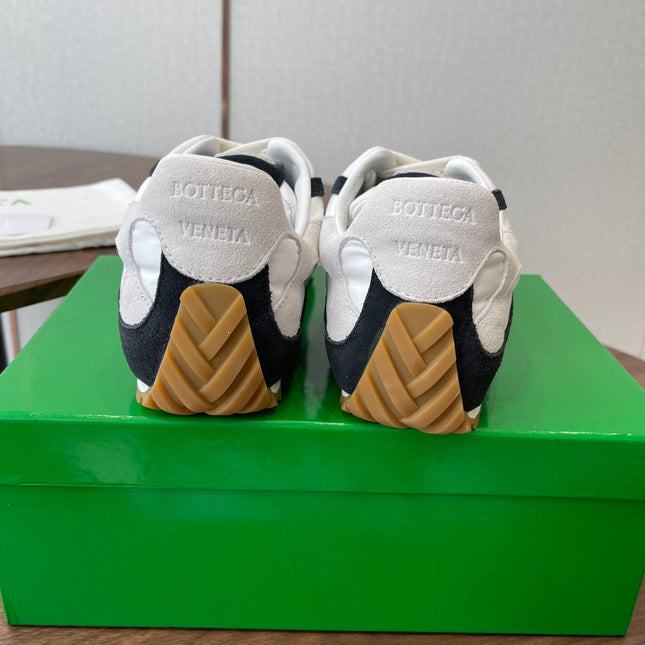 BOTTEGA VENETA 26S ORBIT FLASH SNEAKERS IN WHITE AND BLACK SUEDE