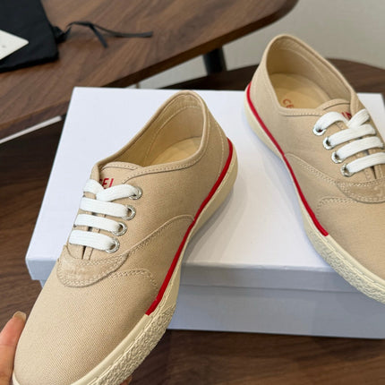 CELINE 26S TRIOMPHE LOW TOP SNEAKERS IN BEIGE CANVAS RED TRIM