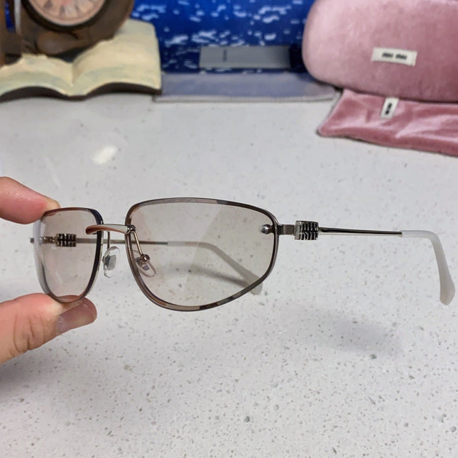 MIUMIU 26S RECTANGULAR FRAME IN METAL 426396