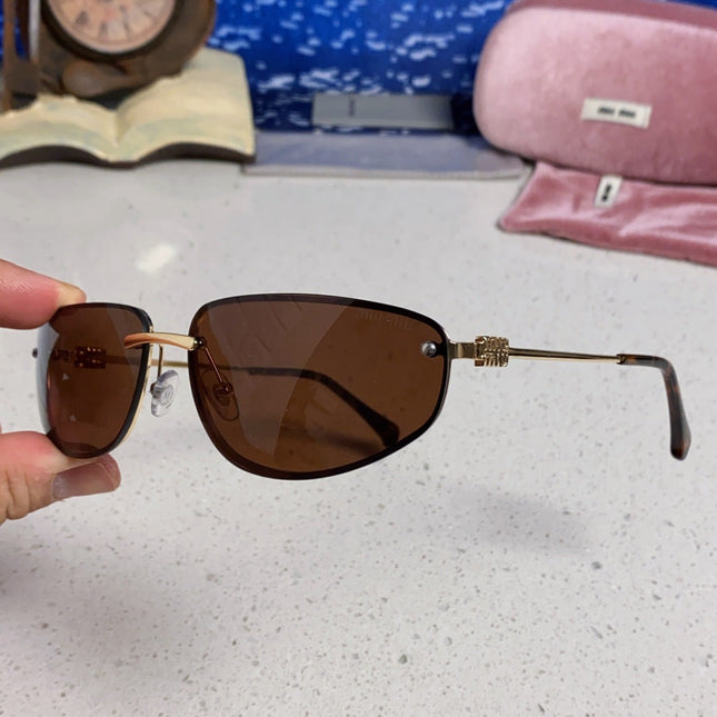 MIUMIU 26S RECTANGULAR FRAME IN METAL 426398