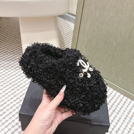 CHANEL 25S CLASSIC FURRY SLIDES IN BLACK WITH DOUBLE C LOGO