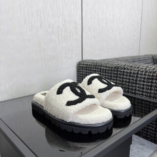 CHANEL 26S SLIDE SANDALS  IN BLACK AND WHITE SHEARLING
