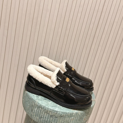 MIUMIU 25S PENNY LOAFERS 20MM IN BLACK PATENT CALFSKIN WITH SHEARLING