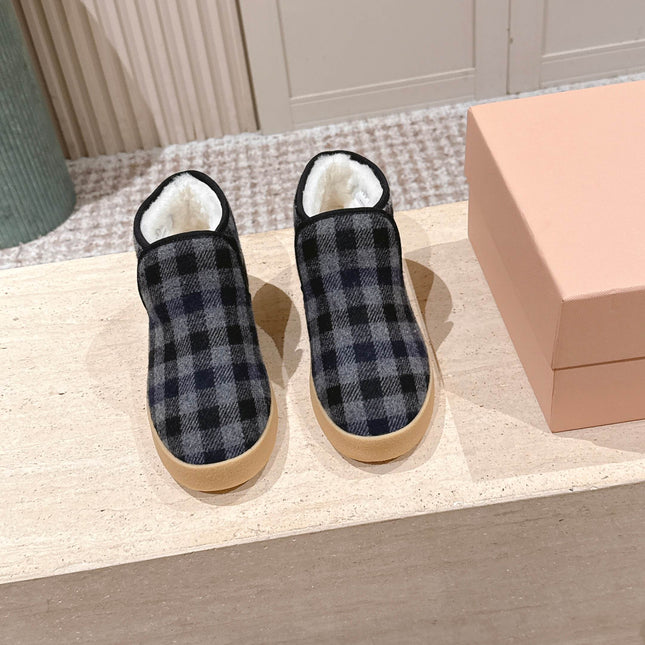 MIUMIU 25S SLIP-ON BOOTIES IN BLACK AND BLUE WOOL WITH SHEARLING