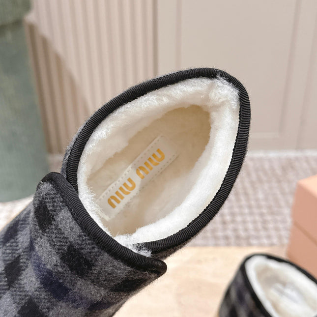 MIUMIU 25S SLIP-ON BOOTIES IN BLACK AND BLUE WOOL WITH SHEARLING