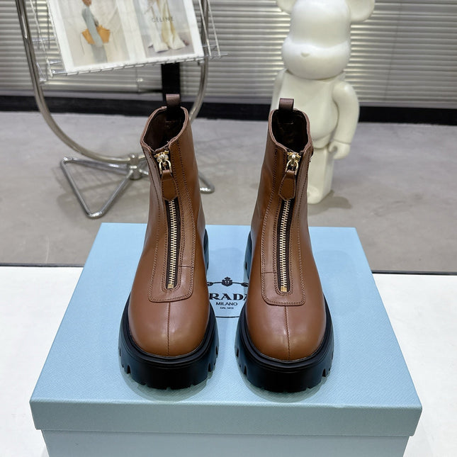 PRADA 25S ZIP-UP ANKLE BOOTS IN BROWN CALFSKIN