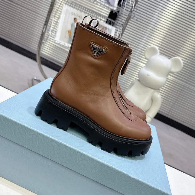 PRADA 25S ZIP-UP ANKLE BOOTS IN BROWN CALFSKIN