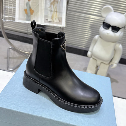 PRADA 25S RETRO PLATFORM MARTIN BOOTS IN BLACK CALFSKIN