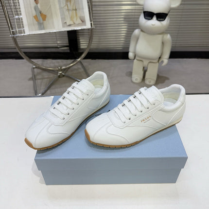 PRADA 26S LACE UP SNEAKERS IN WHITE CALFSKIN
