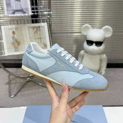 PRADA 26S LACE UP SNEAKERS IN LIGHT BLUE NYLON AND SUEDE