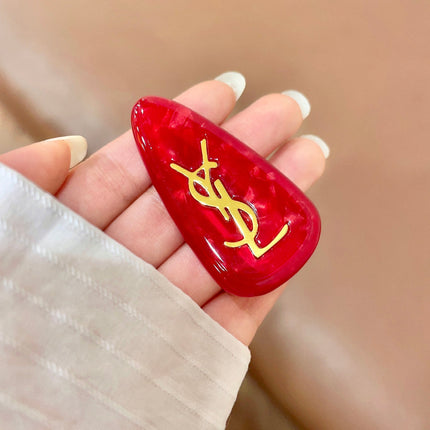 YSL 26S LOGO MARBLE EFFECT HAIR CLIP IN RED RESIN 621488
