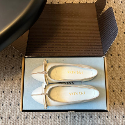PRADA 26S POINTED TOE BOW FLATS IN IVORY WHITE CALFSKIN