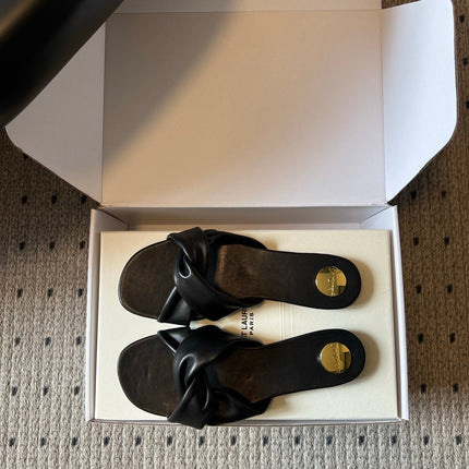 YSL 26S TWISTED-STRAP FLAT SANDALS IN BLACK LAMBSKIN