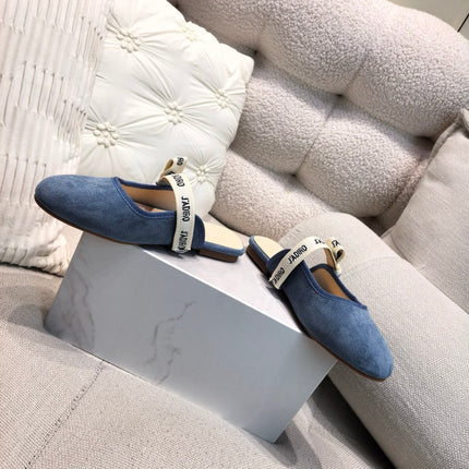 DIOR 26S FLAT MULES IN BLUE SUEDE WITH J'ADIOR BOW