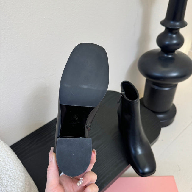 MIUMIU 25S ANKLE BOOTS 65MM IN BLACK CALFSKIN