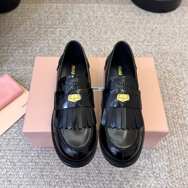 MIUMIU 26S FRINGE PENNY LOAFERS IN BLACK CALFSKIN