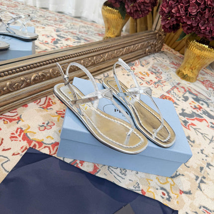 PRADA 26S THONG SANDALS IN SILVER CALFSKIN TRIANGLE LOGO