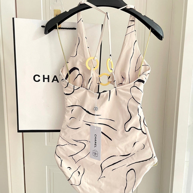 CC BIKINI SWIMSUIT SET IN CREAMY WHITE MIXED WITH CURVED BLACK DETAIL 608919