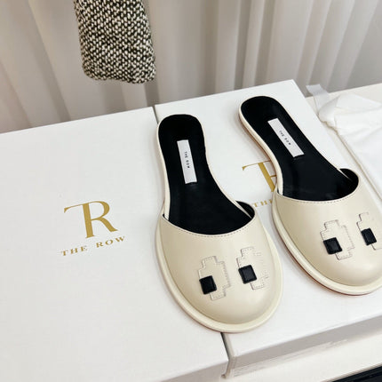 THE ROW 26S PIXEL APPLIQUE MULES IN IVORY WHITE CALFSKIN