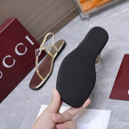 GUCCI 26S INTERLOCKING G THONG SANDALS IN GOLD CALFSKIN