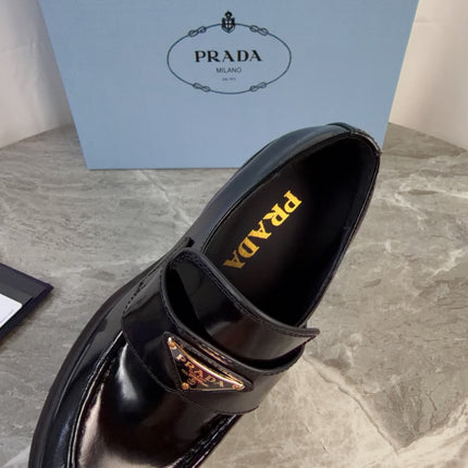 PRADA 26S HEELED LOAFERS 85 MM IN BLACK CALFSKIN