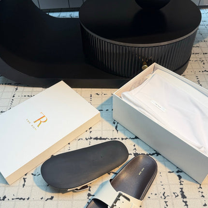 THE ROW 26S BUCKLE SLIDE SANDALS IN WHITE CALFSKIN