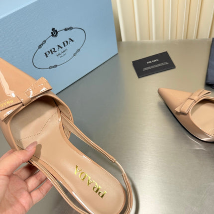 PRADA 26S POINTED-TOE SLINGBACK PUMPS IN BEIGE PATENT CALFSKIN WITH BOW