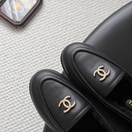 CHANEL 26S LOAFERS IN BLACK CALFSKIN AND SHEARLING LINING