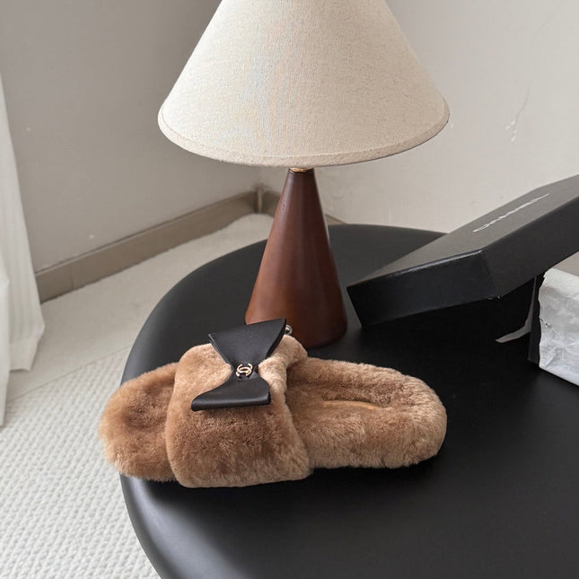 CHANEL 26S SLIDE SANDALS IN BROWN SHEARLING WITH BLACK BOW