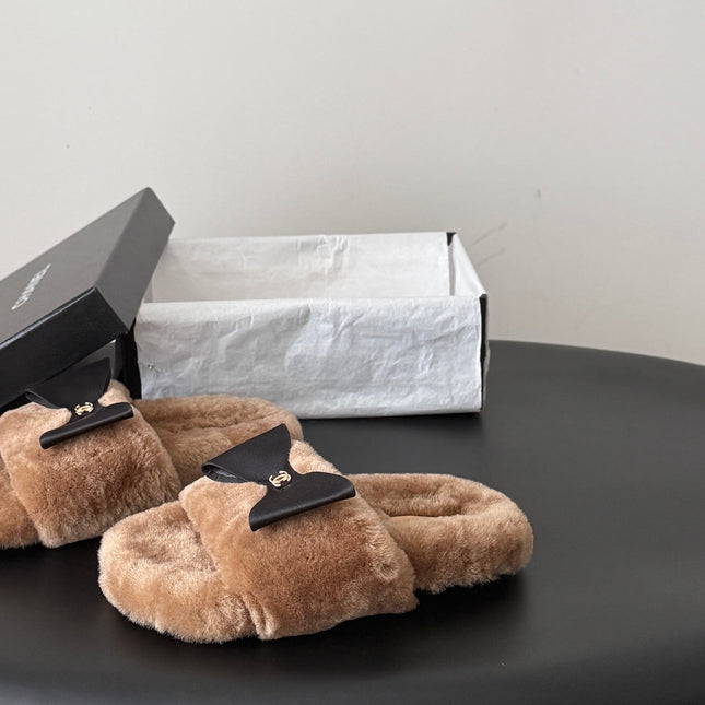 CHANEL 26S SLIDE SANDALS IN BROWN SHEARLING WITH BLACK BOW