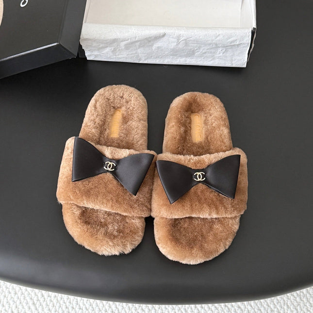 CHANEL 26S SLIDE SANDALS IN BROWN SHEARLING WITH BLACK BOW