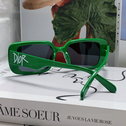 MONTAIGNE SUNGLASS 571594 IN GREEN ACETATE TEXT LOGO