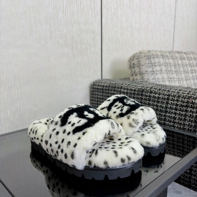 CHANEL 26S PLATFORM SLIDE SANDALS IN WHITE AND BLACK SHEARLING DALMATIAN PRINT