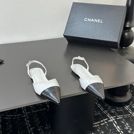 CHANEL 26S POINTED-TOE SLINGBACKS IN WHITE AND BLACK LAMBSKIN