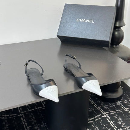 CHANEL 26S SLINGBACK FLATS IN BLACK AND WHITE LAMBSKIN