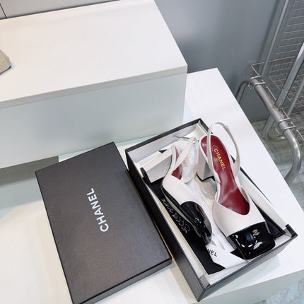CHANEL 26S SLINGBACK 95 MM IN WHITE LAMBSKIN WITH BLACK CAP TOE