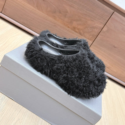 BALENCIAGA 25S MULES IN BLACK FAUX FUR